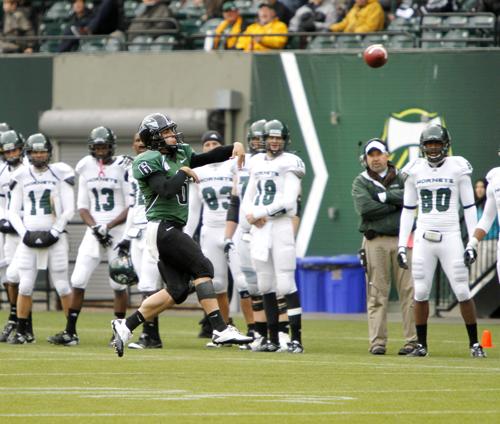 Bombs away: Portland state senior quarterback Connor Kavanough (middle, #6) airs out a pass downfield.