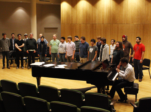 Rising voices: The PSU Man Choir rehearses for its upcoming winter-themed concert.
