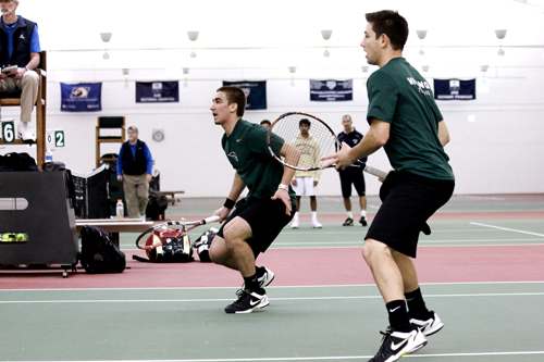 Double Trouble: Juniors Zach Lubek (left) and Nick Fracchia (right) hit the court in a doubles match. Lubek and Fracchia walked away with the weekend’s only doubles win.