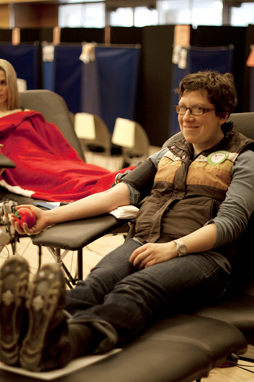 Emily Saxton, a PSU graduate student, prepares to donate blood at the drive in the SMSU ballroom.