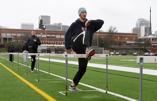 The war of the sexes: Viking men practice at hurdles. While the women found great success this season, the men have fallen short of expectations. Coach Harrison hopes they will have more of an impact in the spring.