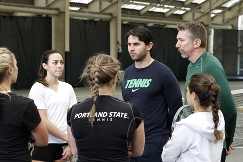 Courting Success: Head coach Jay Sterling (right) and assistant coach Angelo Niculesco (center) speak to the women’s team after a practice. The Vikings will get their last shot at a conference win this season as they close out their schedule at home.